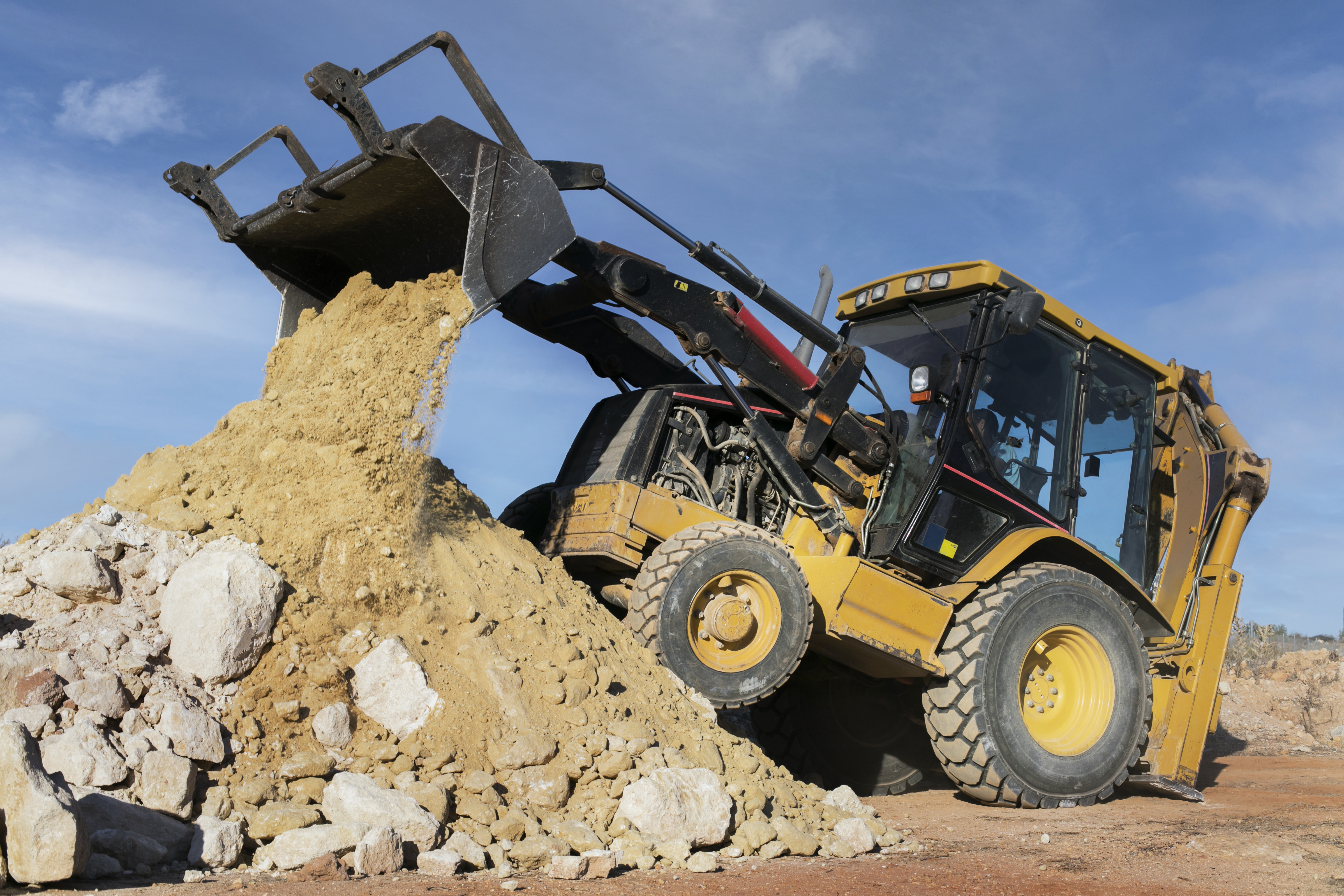 Gravemaskin i arbeid